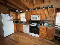 Kitchen Equipped with Stove, Microwave, Refrigerator, Dishwasher, and both regular Coffee Maker and Keurig